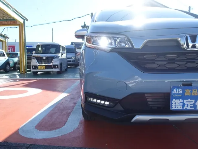 フリード(ホンダ)クロスターホンダセンシング　ＬＥＤヘッドライト登録済未使用車 25