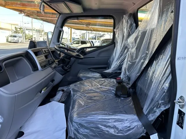キャンター(三菱)全低床キョウカダンプ ３ｔレンタ登録済未使用車 3