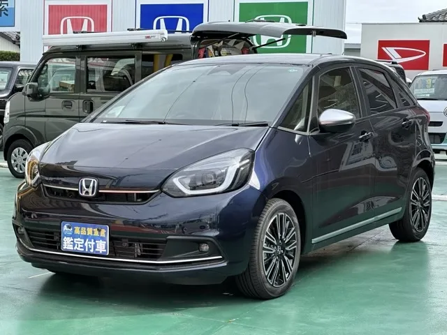 フィット(ホンダ)e：HEV リュクス登録済未使用車 1