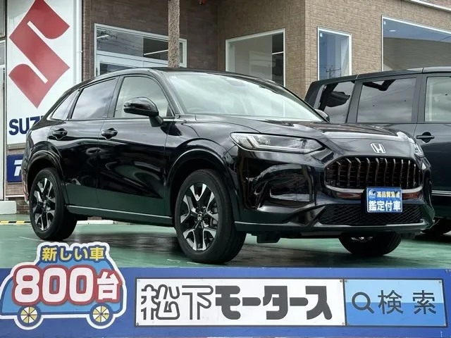 ZR-V(ホンダ)e：HEV Z BSI 後退出庫サポートレス登録済未使用車 0