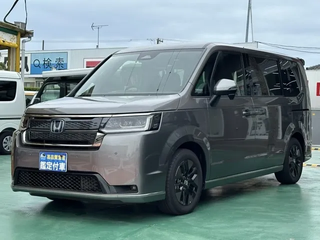 ステップワゴン(ホンダ)e・HEVスパーダ 7人登録済未使用車 1