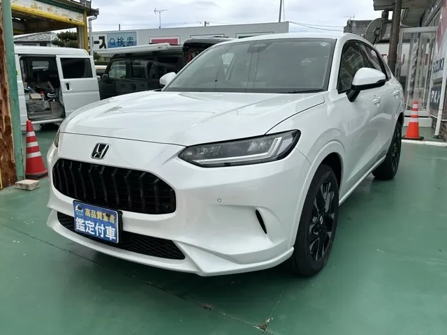 ZR-V(ホンダ)e：HEV Z BSI 後退出庫サポートレス登録済未使用車 1