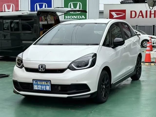 フィット(ホンダ)e：HEV ホーム ブラックスタイル登録済未使用車 1