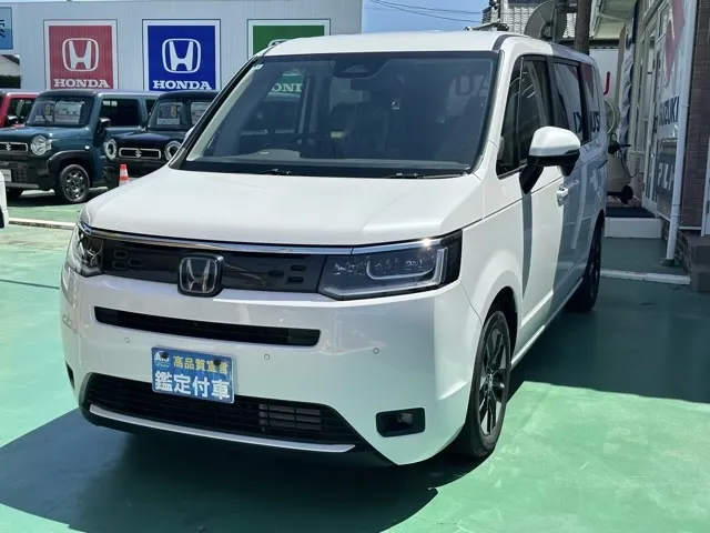 ステップワゴン(ホンダ)e・HEVエアー 8人登録済未使用車 1