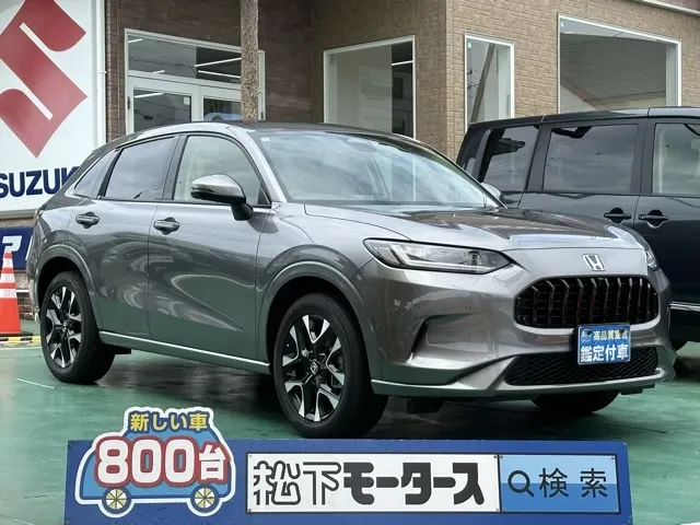 ZR-V(ホンダ)e：HEV Z BSI 後退出庫サポートレス登録済未使用車 0