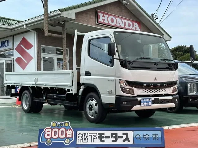 キャンター(三菱)平ボディ ３ｔワイドロング MT 1ナンバー車レンタ登録済未使用車 0