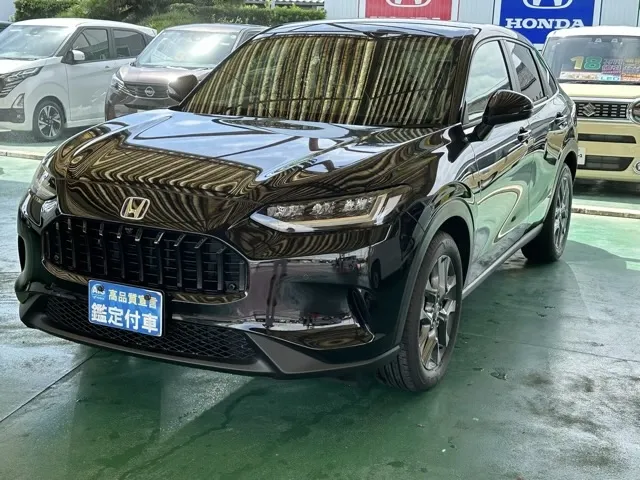 ZR-V(ホンダ)e：HEV X BSI 後退出庫サポートレス登録済未使用車 1