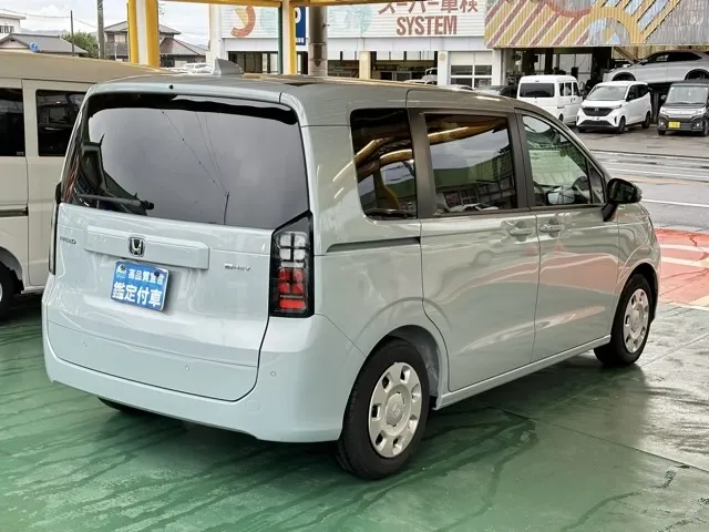 フリード(ホンダ)e：HEV エアー登録済未使用車 11