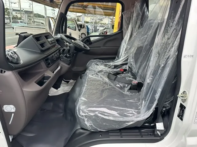 キャンター(三菱)全低床キョウカダンプ ３ｔレンタ登録済未使用車 3