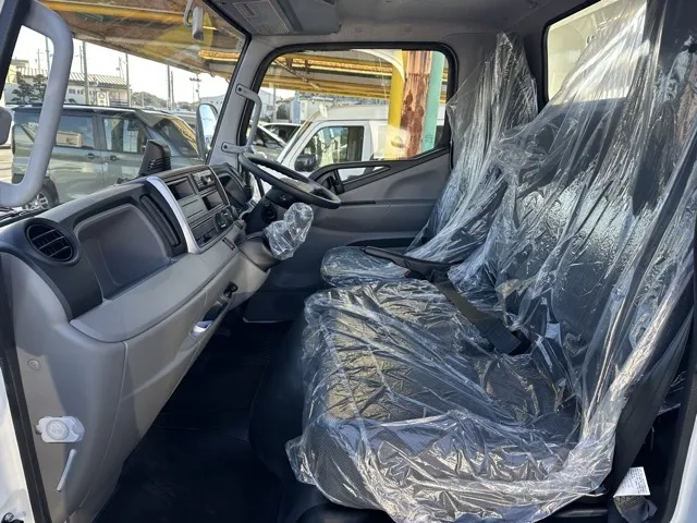 キャンター(三菱)全低床キョウカダンプ ３ｔレンタ登録済未使用車 3