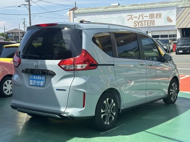 フリード(ホンダ)ハイブリッド クロスター登録済未使用車 11