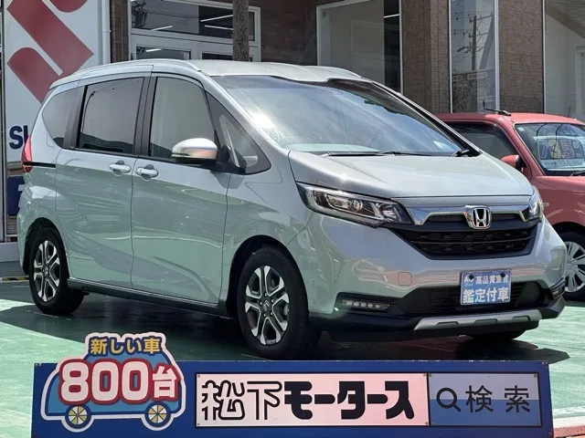 フリード(ホンダ)ハイブリッド クロスター登録済未使用車 0