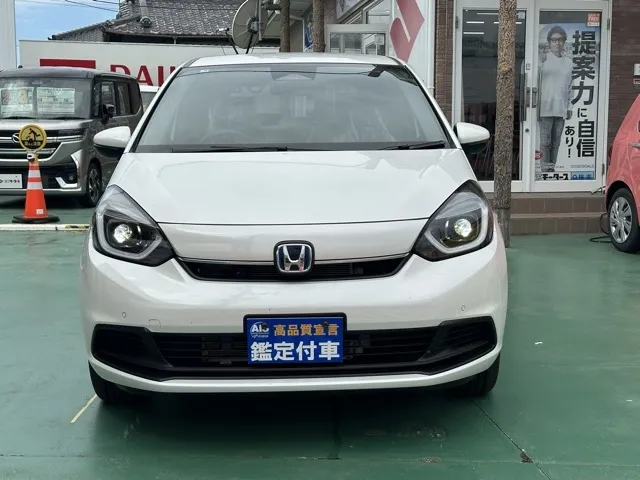 フィット(ホンダ)e：HEV ホーム ４ＷＤ登録済未使用車 25