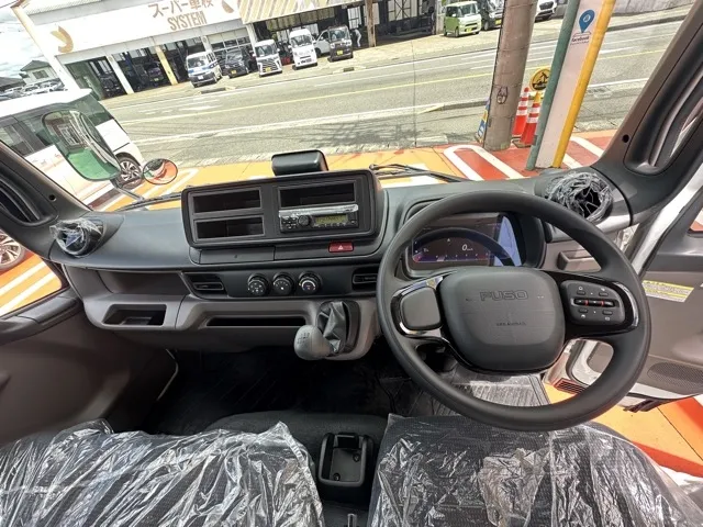 キャンター(三菱)平ボディ ３ｔワイドロング MT 1ナンバー車登録済未使用車 27