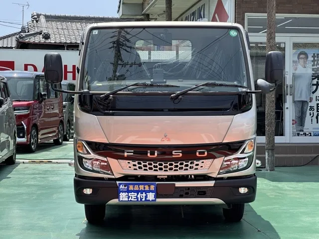 キャンター(三菱)全低床垂直ゲート 平ボディ 2ｔ 5MTレンタ登録済未使用車 25