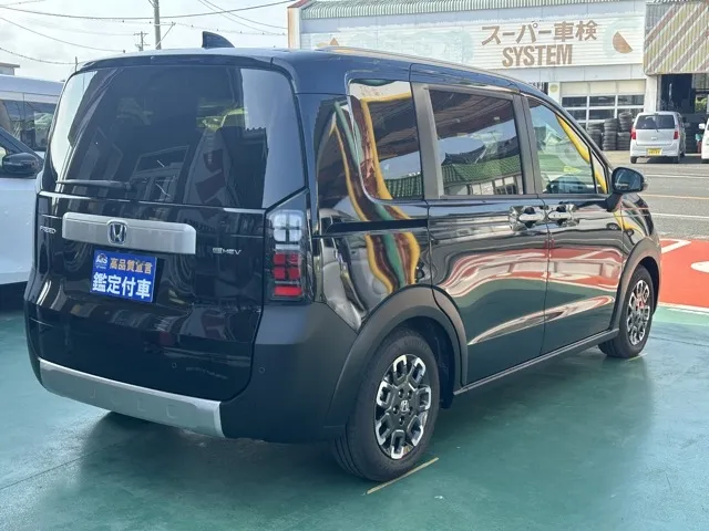 フリード(ホンダ)e：HEVクロスター ６人乗登録済未使用車 14