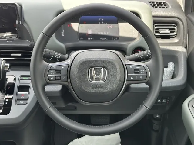 フリード(ホンダ)e：HEVクロスター ６人乗登録済未使用車 7