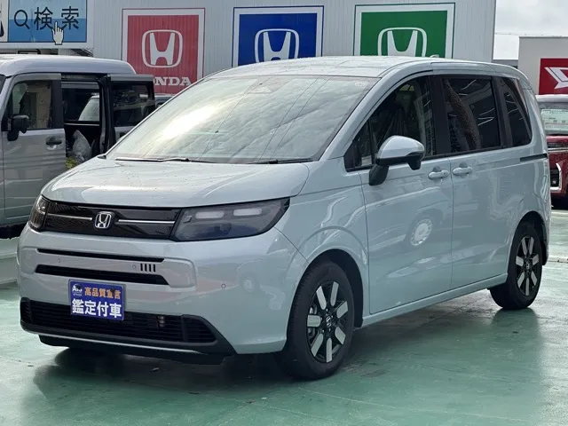 フリード(ホンダ)e：HEV エアー EX ６人乗登録済未使用車 1