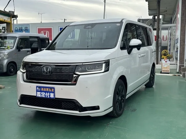 ステップワゴン(ホンダ)e・HEVスパーダ 7人登録済未使用車 1