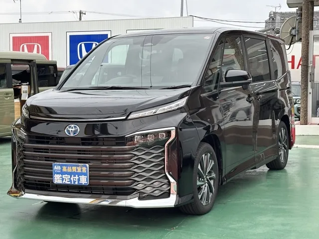 ヴォクシー(トヨタ)ハイブリッドS-Z 7人 プロジェクター式LED DVD登録済未使用車 1