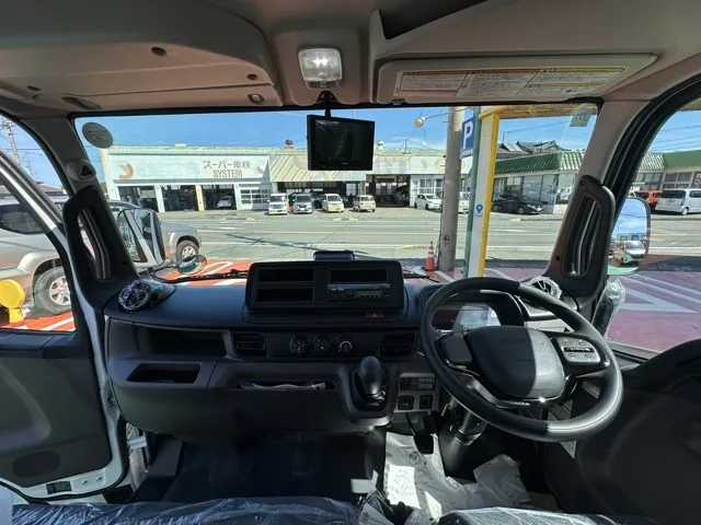 キャンター(三菱)全低床キョウカダンプ ３ｔレンタ登録済未使用車 4