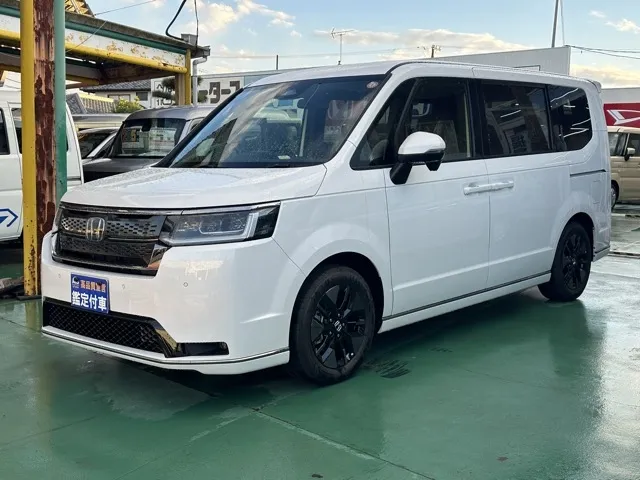 ステップワゴン(ホンダ)e・HEVスパーダ 7人登録済未使用車 1
