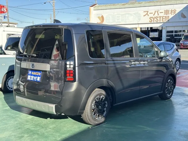 フリード(ホンダ)e：HEVクロスター 5人乗登録済未使用車 11