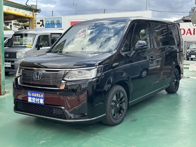 ステップワゴン(ホンダ)e・HEVスパーダ 7人登録済未使用車 1