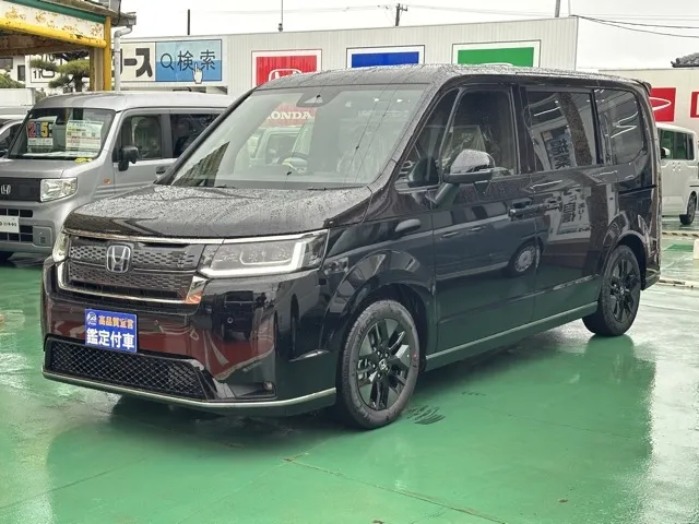 ステップワゴン(ホンダ)e・HEVスパーダ 7人登録済未使用車 1
