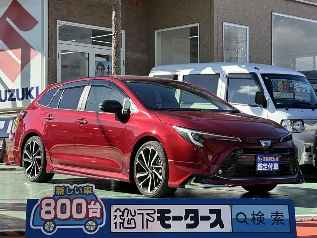 カローラ(トヨタ)ハイブリッドダブルバイビー中古車 0