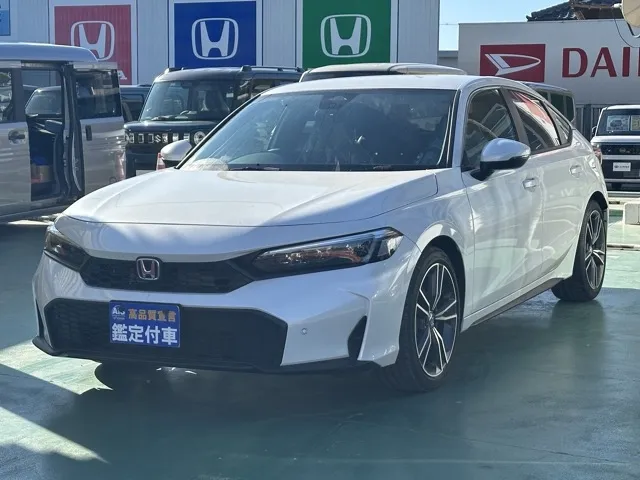 シビック(ホンダ)e：HEV LX登録済未使用車 1