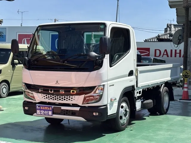 キャンター(三菱)全低床 平ボディ ２ｔレンタ登録済未使用車 1