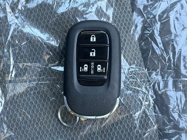 フリード(ホンダ)e：HEVクロスター ６人乗登録済未使用車 28