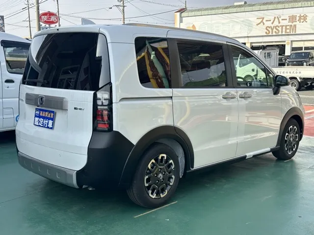 フリード(ホンダ)e：HEVクロスター 5人乗登録済未使用車 12