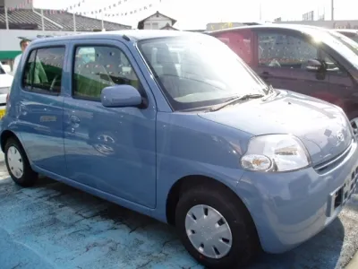 エッセ(ダイハツ)Lスモークガラス付未使用車 0