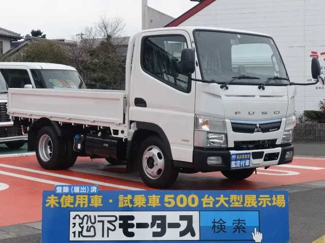 キャンター(三菱)全低床　平ボディ　２ｔ登録済未使用車 0