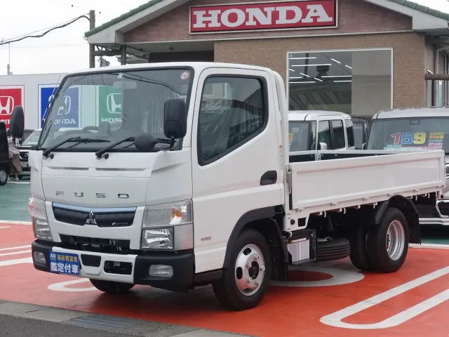 キャンター(三菱)全低床　平ボディ　２ｔ登録済未使用車 1